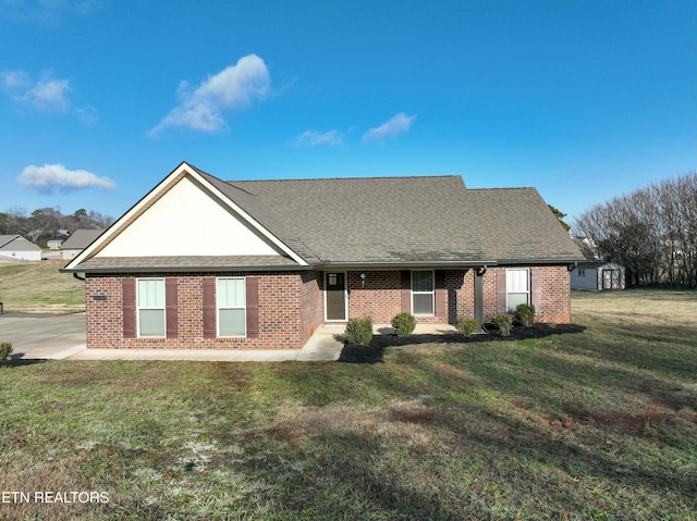 single story home with a front lawn