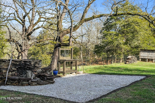 view of yard with fence