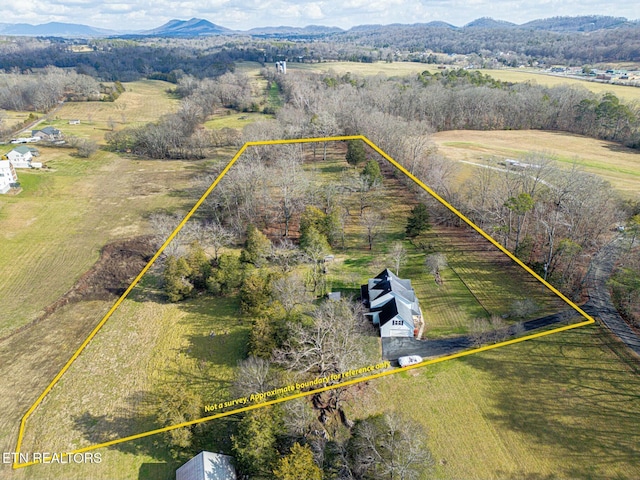 drone / aerial view with a rural view and a mountain view