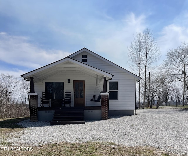 view of front facade featuring crawl space and a porch