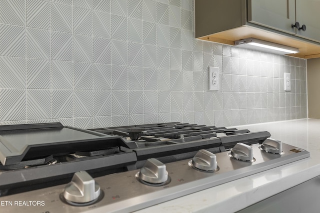 360 Poppy Pl, Lenoir City, TN 37772 - room details featuring stainless steel gas cooktop and decorative backsplash