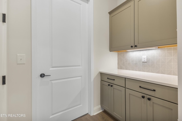 360 Poppy Pl, Lenoir City, TN 37772 - interior space with dark wood-type flooring, gray cabinets, light countertops, and decorative backsplash