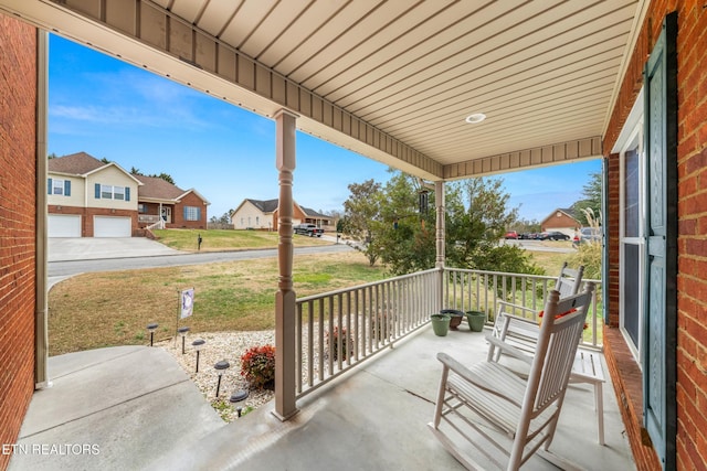 view of patio featuring a porch