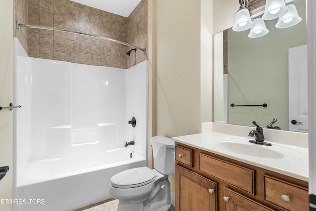 full bathroom with shower / tub combination, vanity, and toilet