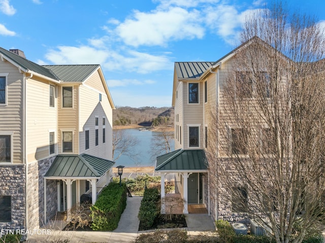 view of building exterior featuring a water view