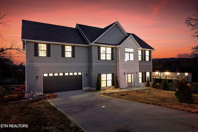 view of front of house featuring a garage and french doors