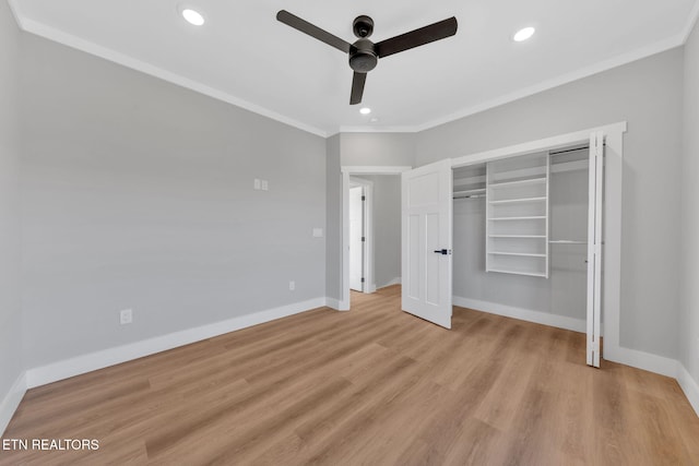 unfurnished bedroom featuring ceiling fan, ornamental molding, a closet, and light hardwood / wood-style flooring