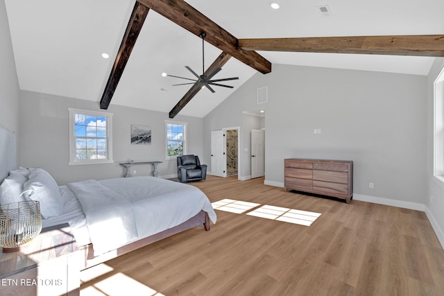 bedroom featuring beam ceiling, high vaulted ceiling, and light wood-type flooring