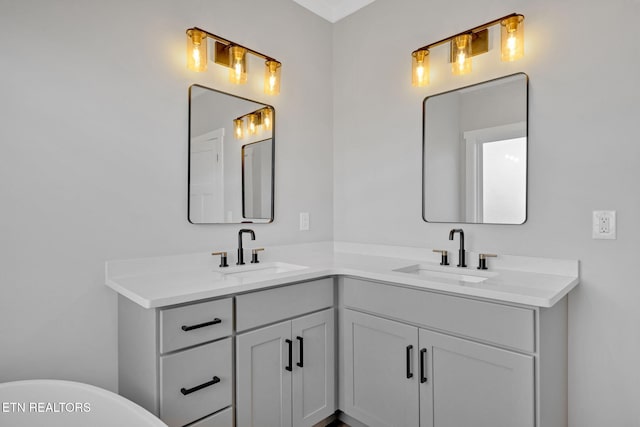 bathroom with vanity and a bathtub