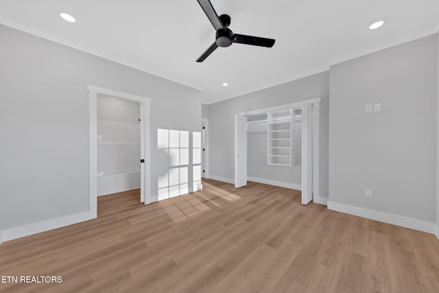 unfurnished bedroom with light hardwood / wood-style flooring, ceiling fan, and a closet