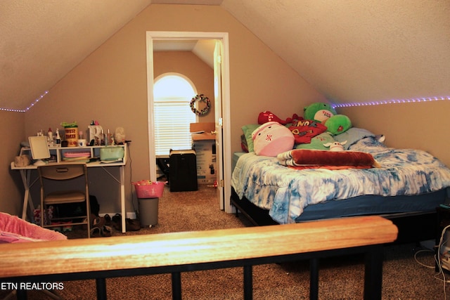 carpeted bedroom with lofted ceiling