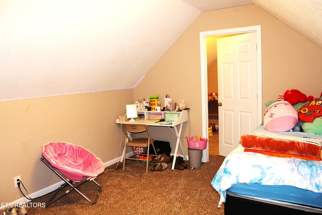 bedroom featuring carpet and vaulted ceiling