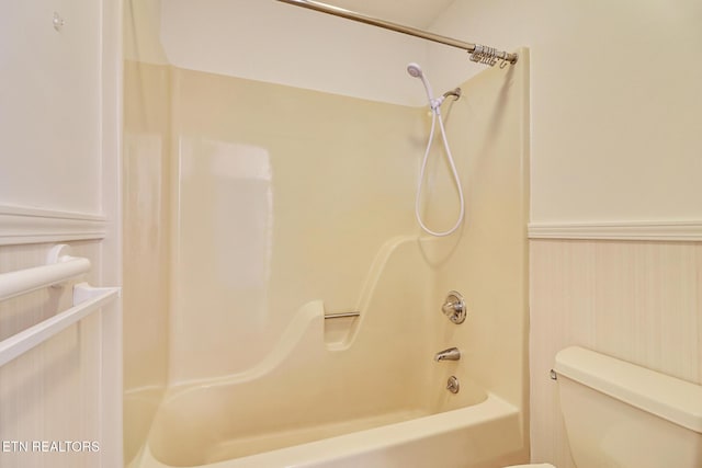 bathroom with  shower combination and toilet