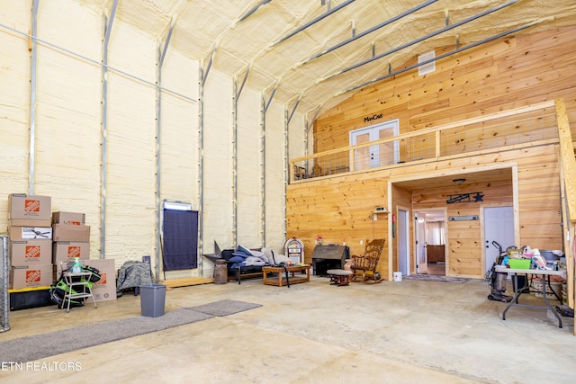 garage featuring wooden walls