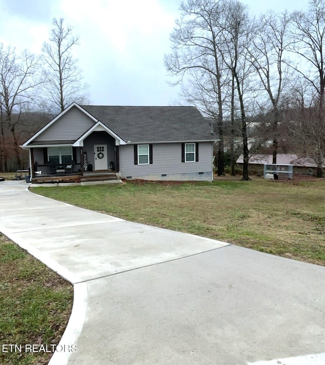 view of front of property with a porch and a front lawn