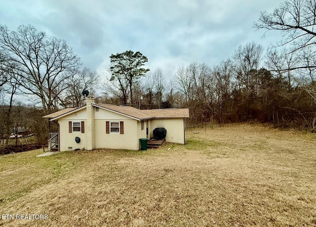 exterior space with a yard