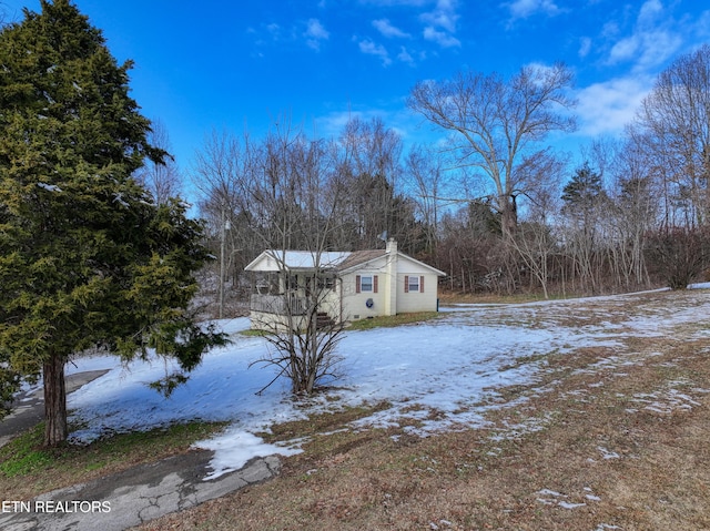 view of snow covered property