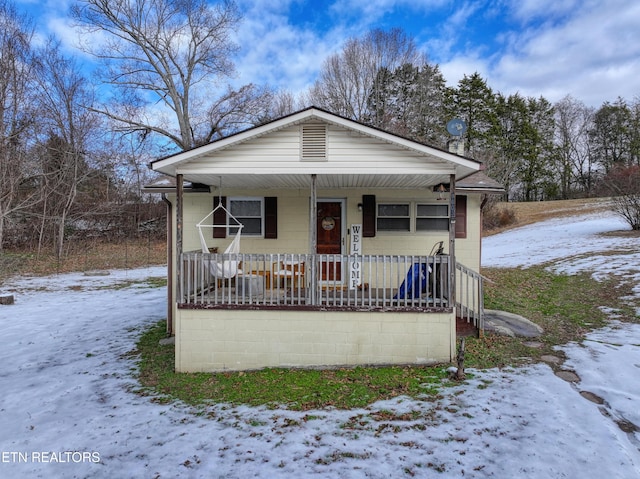 bungalow-style house featuring covered porch