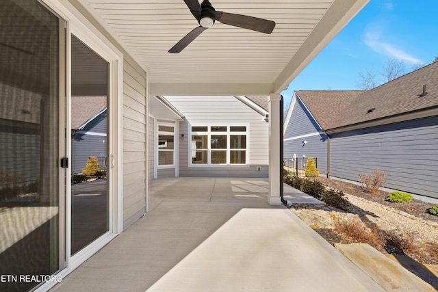 view of patio featuring ceiling fan