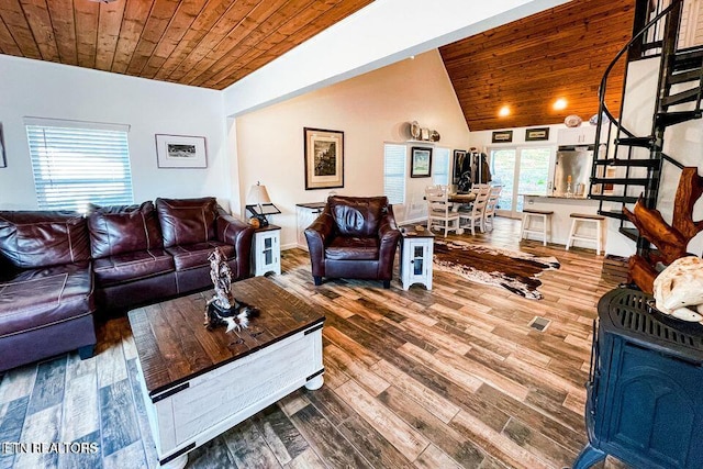 living room featuring lofted ceiling, wood-type flooring, and wooden ceiling