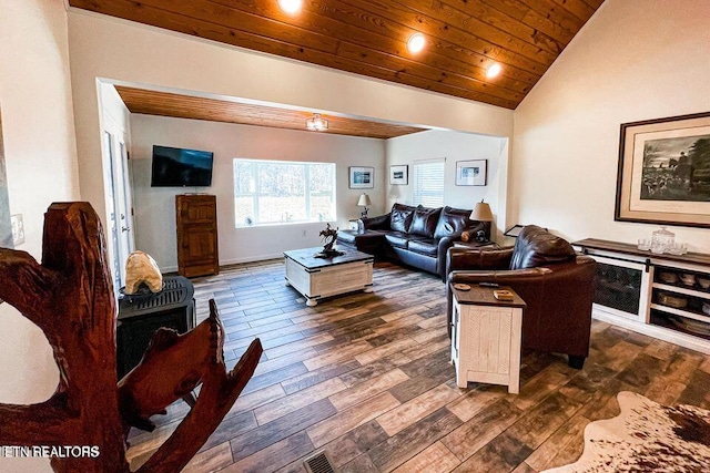 living room with dark wood-type flooring, vaulted ceiling, and wooden ceiling