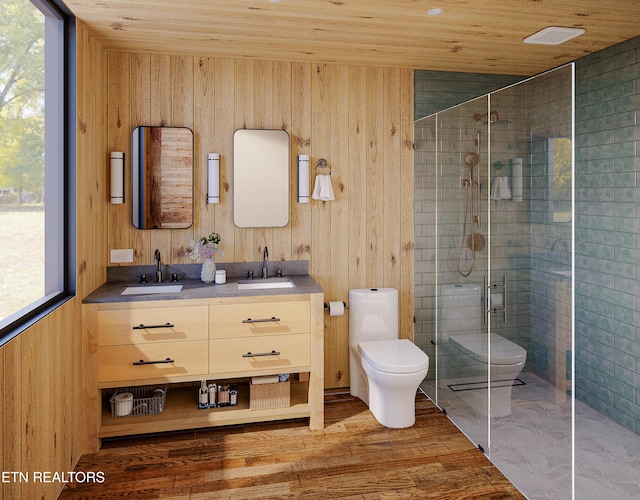 full bath with toilet, wooden ceiling, a shower stall, and a sink