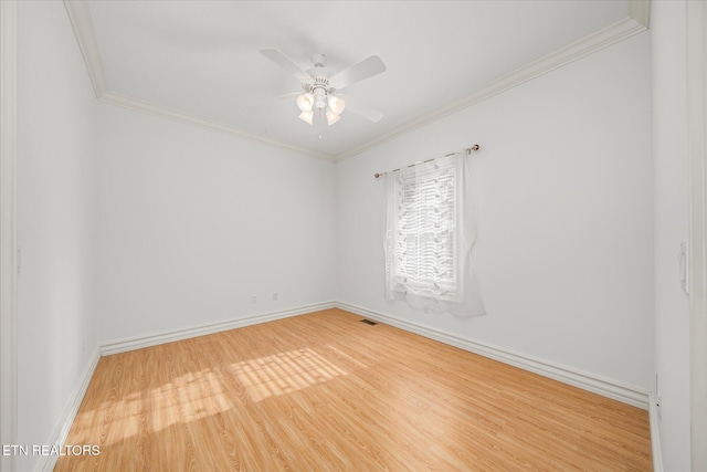 unfurnished room featuring ceiling fan, crown molding, and wood-type flooring