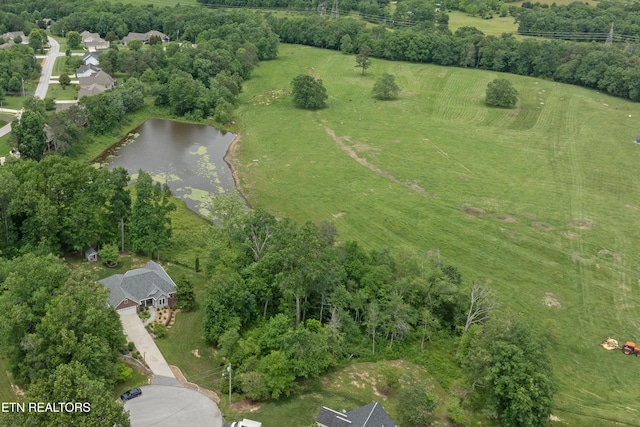 bird's eye view featuring a rural view and a water view