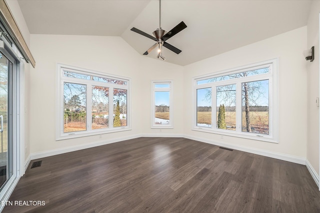 unfurnished sunroom with ceiling fan and vaulted ceiling