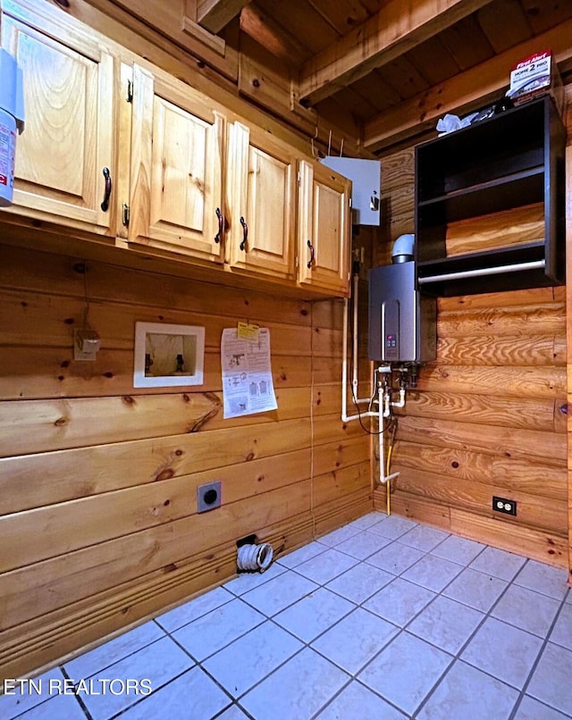 details featuring wood walls and water heater