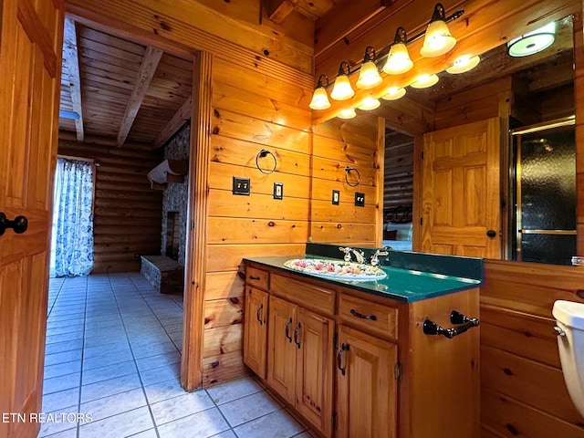 bathroom featuring vanity, tile patterned floors, rustic walls, beamed ceiling, and wood ceiling