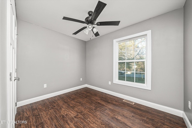 empty room featuring ceiling fan and wood-type flooring