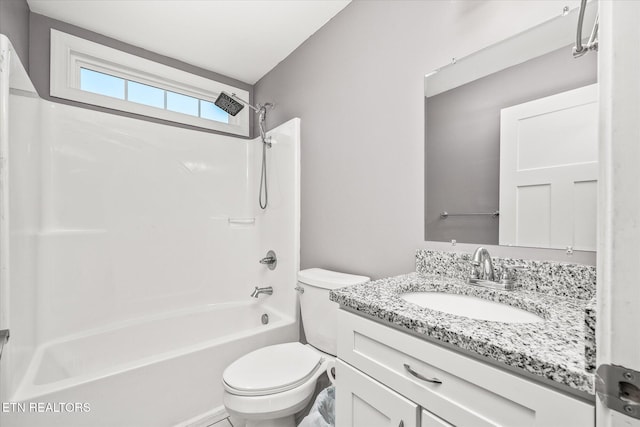 full bathroom with vanity,  shower combination, and toilet