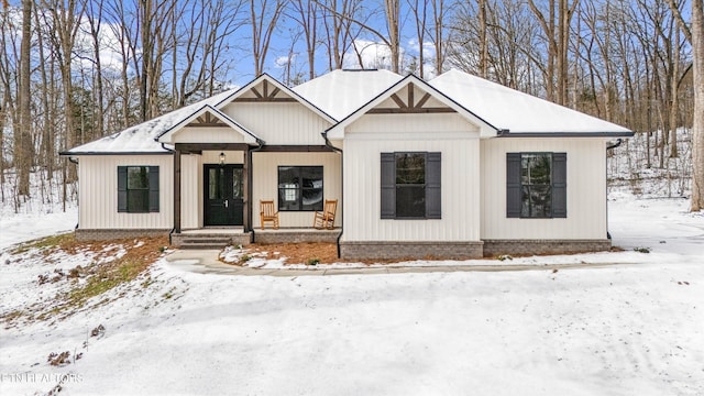 modern farmhouse style home with a porch