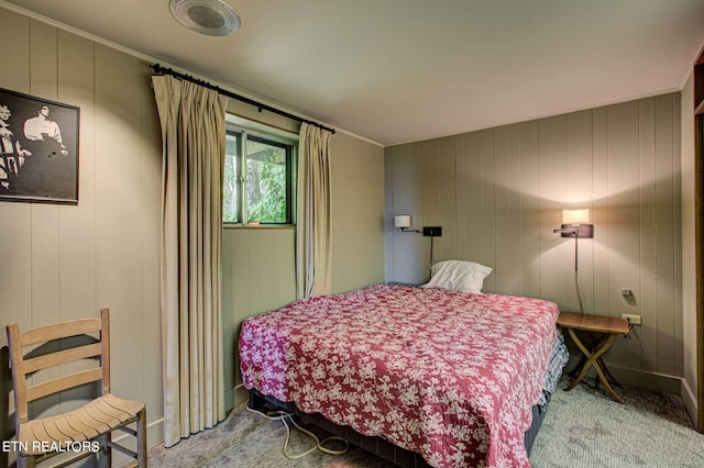 bedroom featuring light colored carpet