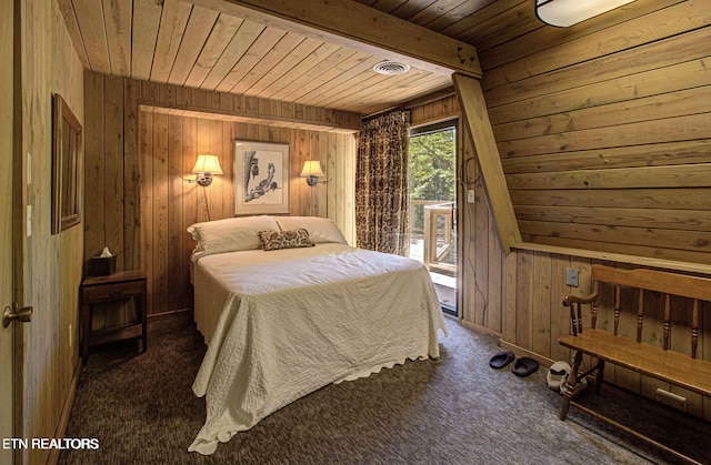 carpeted bedroom featuring beamed ceiling, access to exterior, wooden ceiling, and wood walls