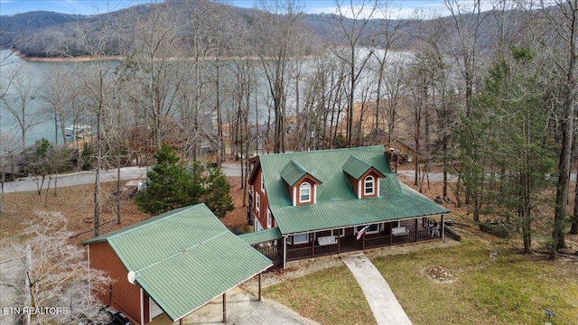 bird's eye view with a water and mountain view