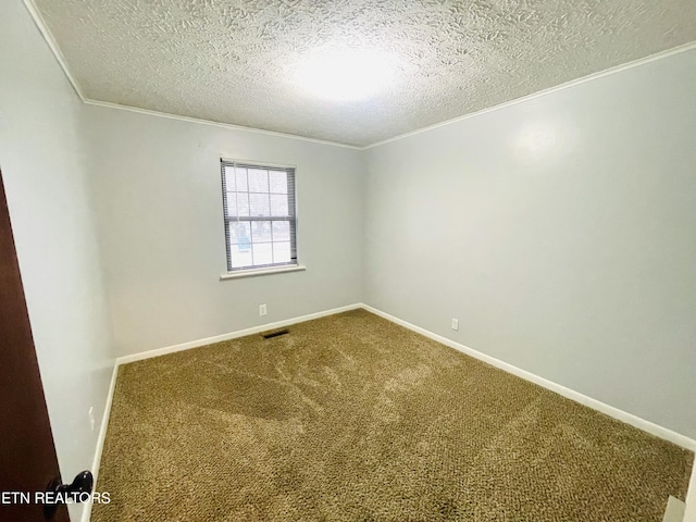 carpeted spare room with a textured ceiling and ornamental molding