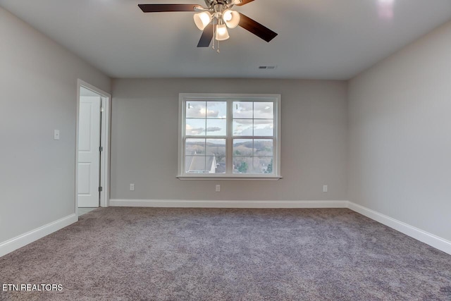 carpeted empty room with ceiling fan