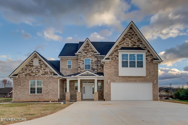 craftsman inspired home featuring a garage