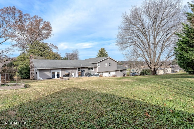 exterior space with a yard