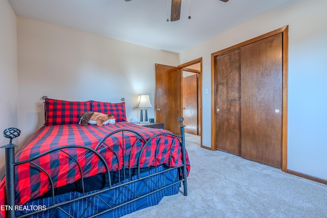 bedroom featuring carpet floors, a closet, and ceiling fan