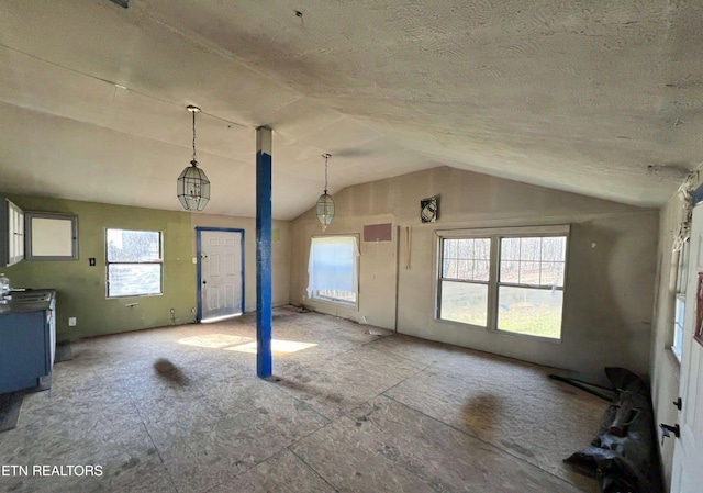 interior space featuring vaulted ceiling