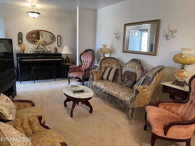 sitting room with carpet flooring