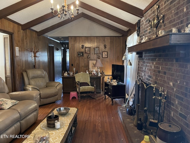 living room with lofted ceiling with beams, dark wood-type flooring, a fireplace, and wooden walls