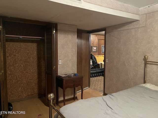 bedroom with a closet and light wood-type flooring