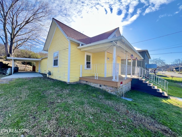 view of property exterior featuring a porch, a carport, and a lawn