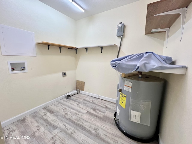 washroom with hookup for an electric dryer, light wood-type flooring, electric water heater, and washer hookup