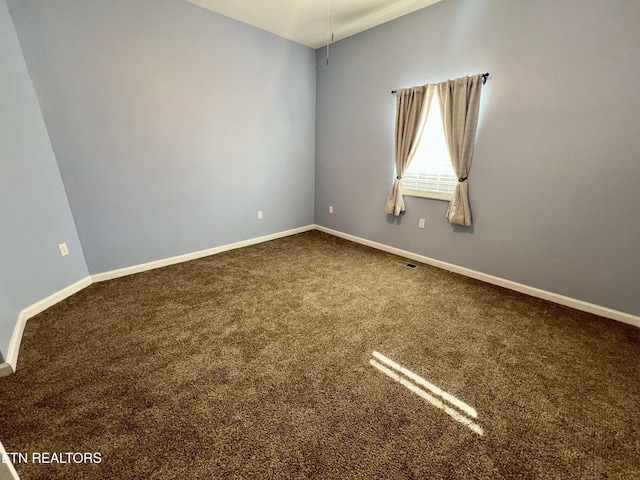 spare room with carpet flooring