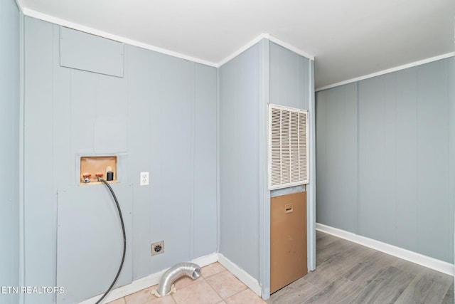 washroom featuring hookup for an electric dryer, hookup for a washing machine, and crown molding